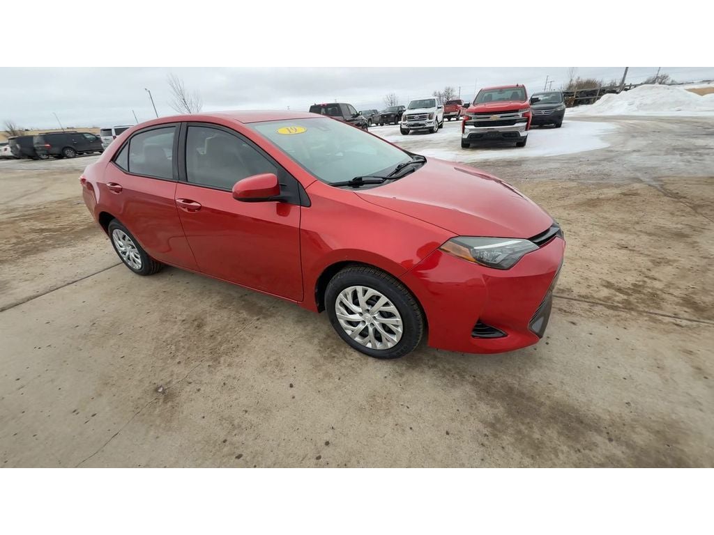 Used 2019 Toyota Corolla LE with VIN 5YFBURHE0KP868588 for sale in Devils Lake, ND